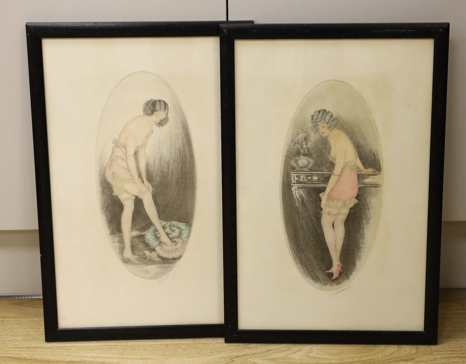 Manner of Louis Icart, two coloured drypoint etchings, Young women undressing, signed in pencil, overall 44 x 28cm